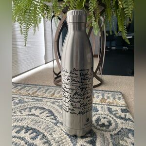 Manna silver 750ml bottle with wine theme - NWOT